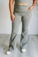 Load image into Gallery viewer, Building Habits Twill Flared Crossover Waist Pant in Dusty Olive
