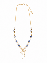 Load image into Gallery viewer, Blue Willow Bow Necklace
