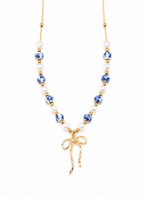 Load image into Gallery viewer, Blue Willow Bow Necklace
